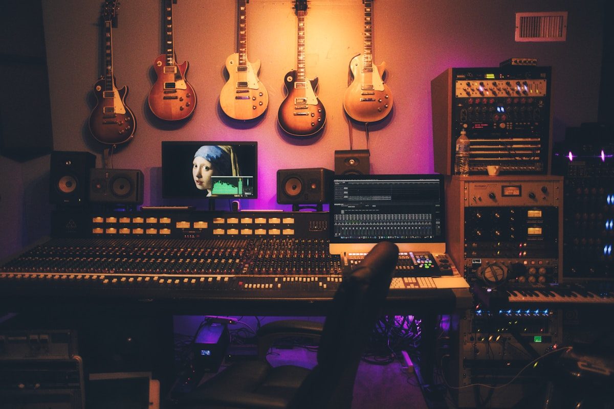 A recording studio microphone in warm light