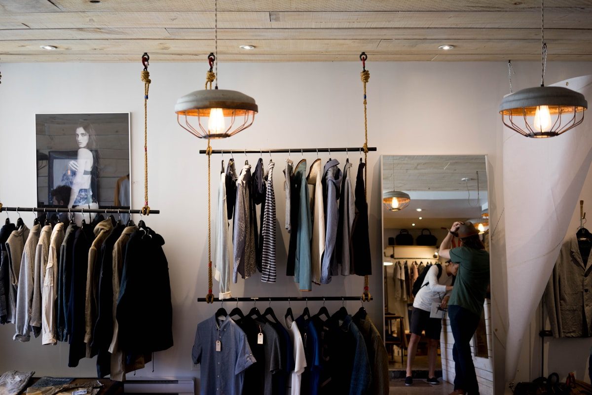 Rails of clothing in a British shop